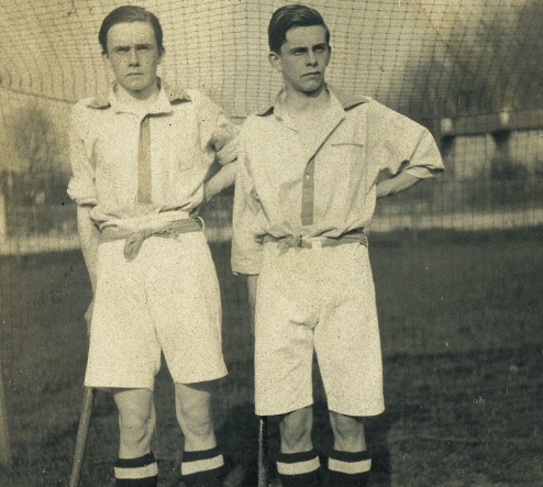 Gilbert and Jack as students playing hockey